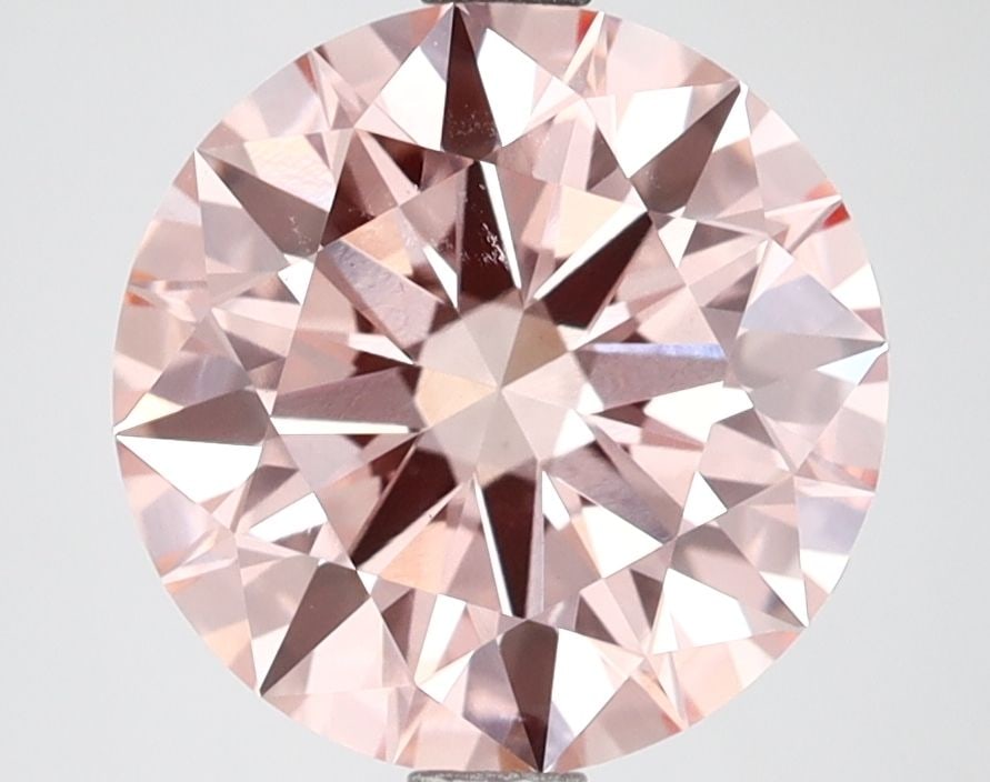 Loose Diamond - ROUND 3.14ct Fancy Vivid Pink VS1: Loose Diamond - ROUND 3.14ct Fancy Vivid Pink VS1 Source: This is a real non-mined Diamond that has been grown in a lab Shape: ROUND Carats: 3.14 Color: Fancy Vivid Pink Certification: IGI Video: