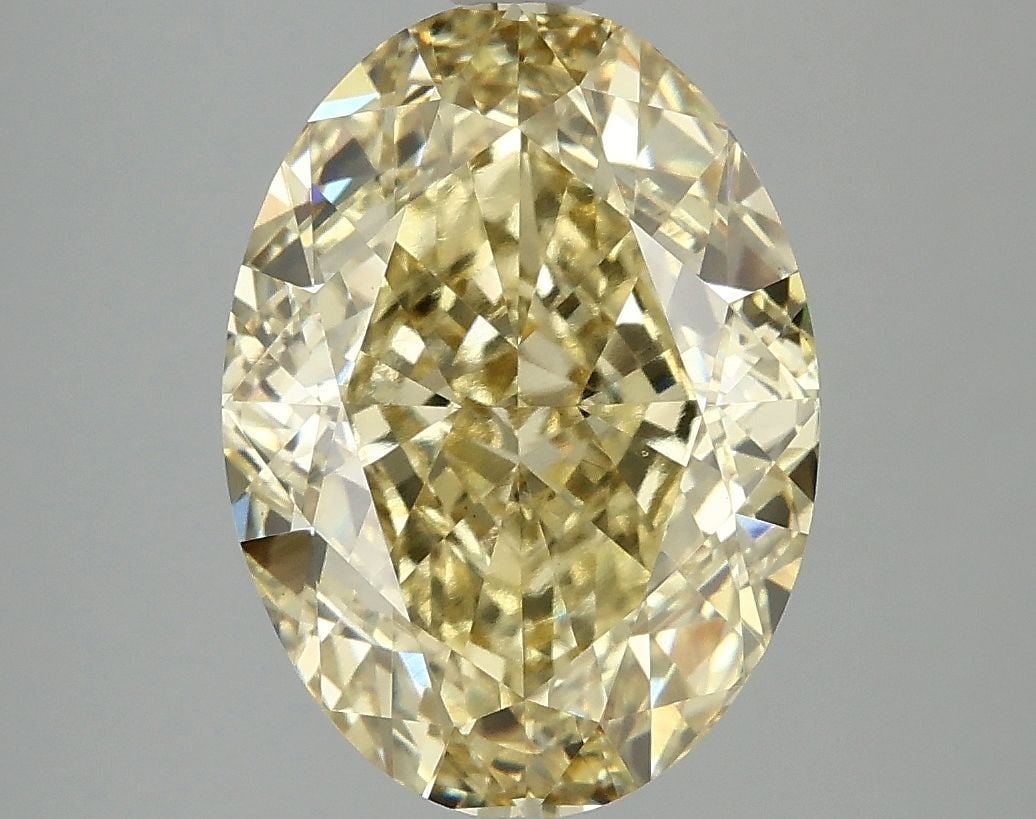 Loose Diamond - OVAL 5.09ct Fancy Intense Yellow VS1: Loose Diamond - OVAL 5.09ct Fancy Intense Yellow VS1 Source: This is a real non-mined Diamond that has been grown in a lab Shape: OVAL Carats: 5.09 Color: Fancy Intense Yellow Certification: IGI