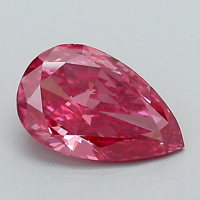 Loose Diamond - PEAR 0.93ct Fancy Vivid Red SI1: Loose Diamond - PEAR 0.93ct Fancy Vivid Red SI1 Source: This is a real non-mined Diamond that has been grown in a lab Shape: PEAR Carats: 0.93 Color: Fancy Vivid Red Certification: NONE Video: