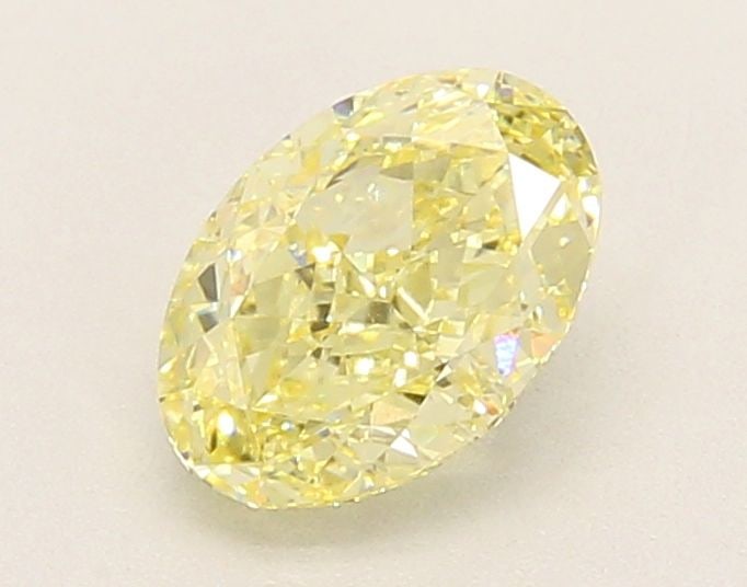 Loose Diamond - OVAL 1.2ct Fancy Intense Yellow VVS2: Loose Diamond - OVAL 1.2ct Fancy Intense Yellow VVS2 Source: This is a real non-mined Diamond that has been grown in a lab Shape: OVAL Carats: 1.2 Color: Fancy Intense Yellow Certification: IGI Video: