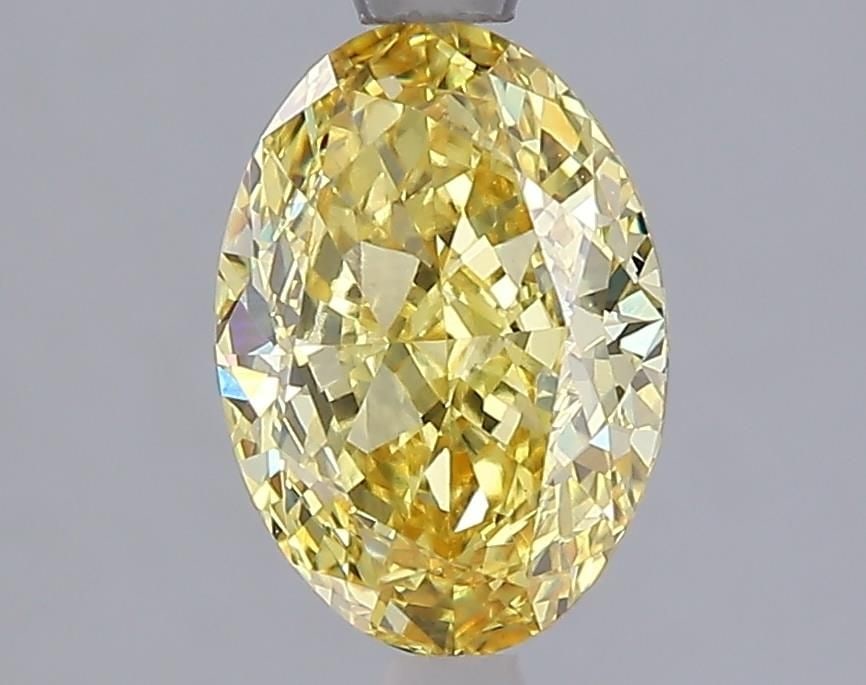Loose Diamond - OVAL 2.01ct Fancy Vivid Yellow VS2: Loose Diamond - OVAL 2.01ct Fancy Vivid Yellow VS2 Source: This is a real non-mined Diamond that has been grown in a lab Shape: OVAL Carats: 2.01 Color: Fancy Vivid Yellow Certification: IGI Video: