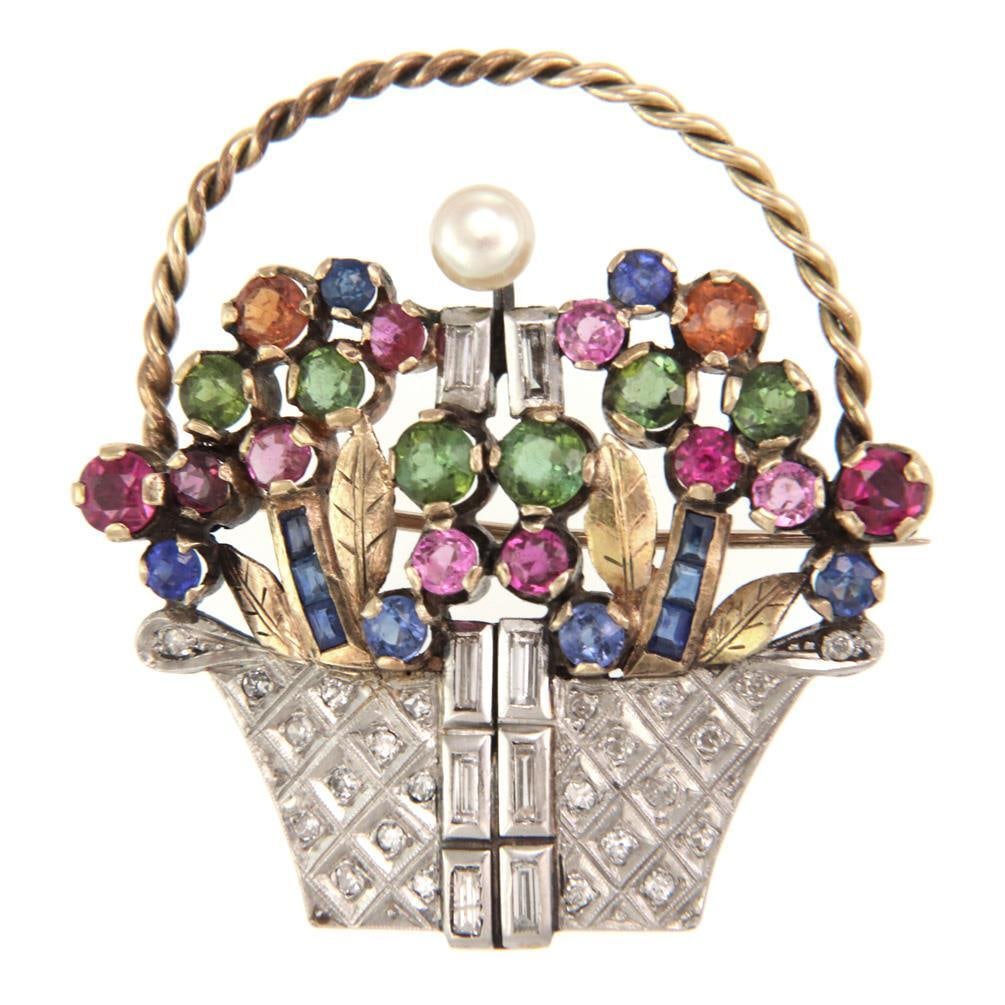 Vintage 9k Gold Floral Basket Brooch with Diamond and Multicolor Gems: Vintage 9k Gold Floral Basket Brooch with Diamond and Multicolor Gems This stunning vintage brooch is a true statement piece, elegantly crafted from 9k yellow and white gold. The design features a flo