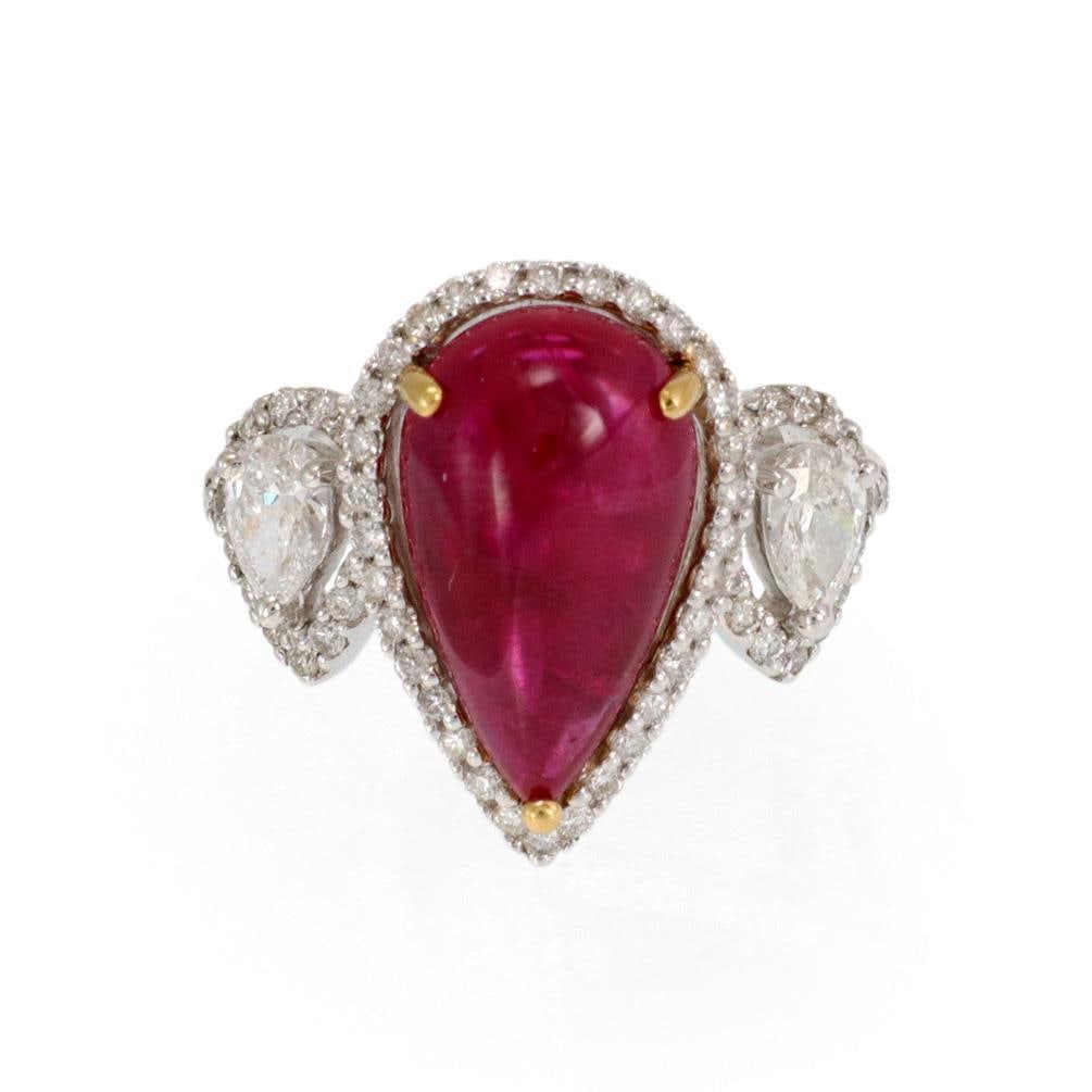 GIA 4.80ct Ruby Diamond 18k Two Tone Gold Cocktail Ring Size 7: GIA 4.80ct Ruby Diamond 18k Two Tone Gold Cocktail Ring Size 7 This exquisite cocktail ring features a stunning 4.80 ct GIA certified pear shape cabochon ruby, securely held by four yellow gold