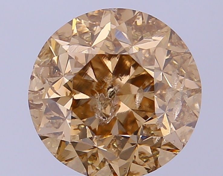 Loose Diamond - ROUND 2.29ct Fancy Brown I1: Loose Diamond - ROUND 2.29ct Fancy Brown I1 Source: Natural Shape: ROUND Carats: 2.29 Color: Fancy Brown Certification: NONE Video: Video Link The Diamond Depot Guarantee: All items in this auction