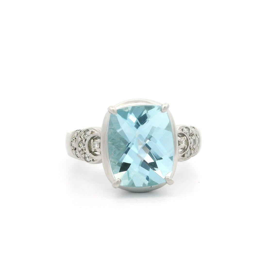 Platinum 3.37ctw Cushion Aquamarine Diamond Cocktail Ring: Platinum 3.37ctw Cushion Aquamarine Diamond Cocktail Ring This stunning cocktail ring features a captivating cushion-cut natural aquamarine, weighing 3.23ct, surrounded by 14 dazzling round brilliant-