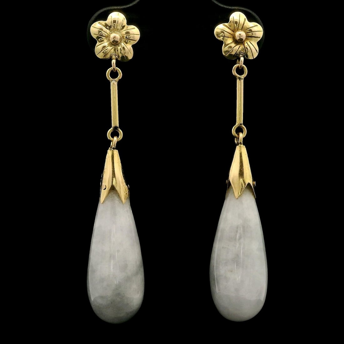 Vintage 14k Gold Dangle Earrings with Mottled Lavender Jade: Vintage 14k Gold Dangle Earrings with Mottled Lavender Jade These exquisite vintage dangle earrings feature a captivating teardrop design crafted from natural genuine jade in a mottled lavender color.