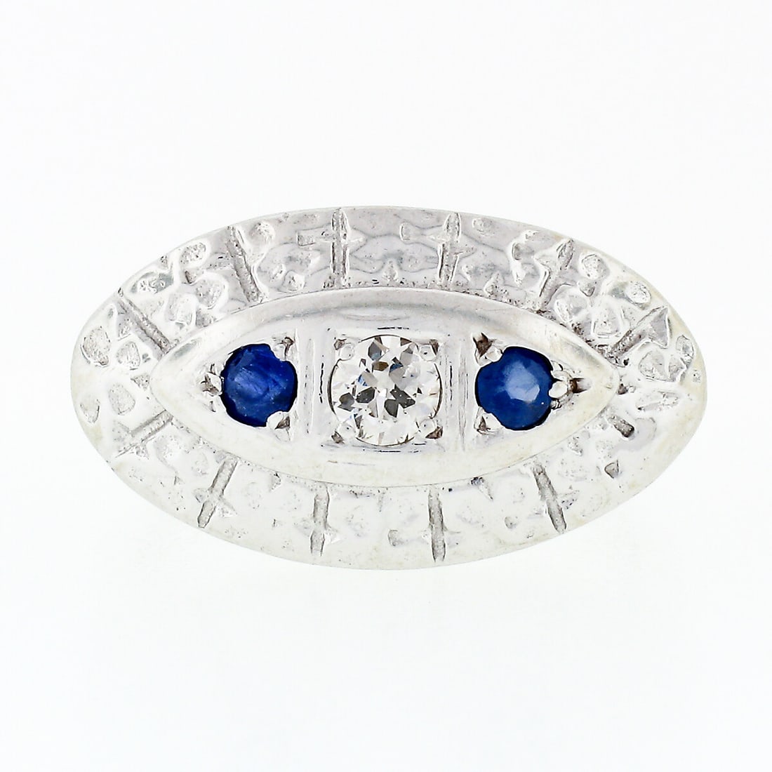Vintage 14k White Gold Floral Ring with 0.25ct Diamond and Sapphire: Vintage 14k White Gold Floral Ring with 0.25ct Diamond and Sapphire This exquisite vintage floral oval platter ring is crafted from solid 14k white gold and features a stunning combination of gemstone