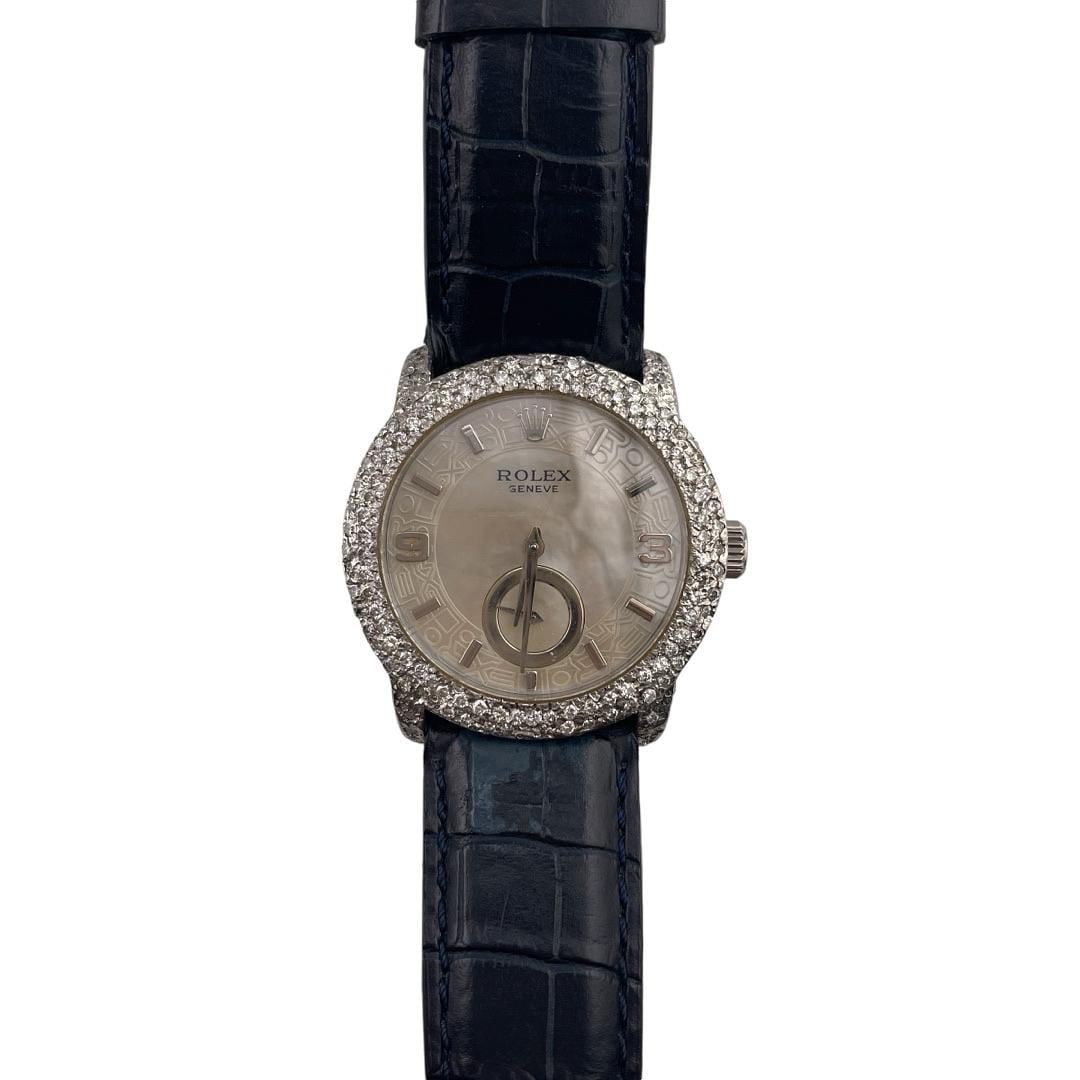 Diamond Bezel Rolex Cellini Ref 5240 Ladies MOP Dial Leather Strap Watch: Diamond Bezel Rolex Cellini Ref 5240 Ladies MOP Dial Leather Strap Watch This ladies' Rolex Cellini features a mother-of-pearl dial, a diamond-set bezel, and a leather bracelet. Reference number 5240.
