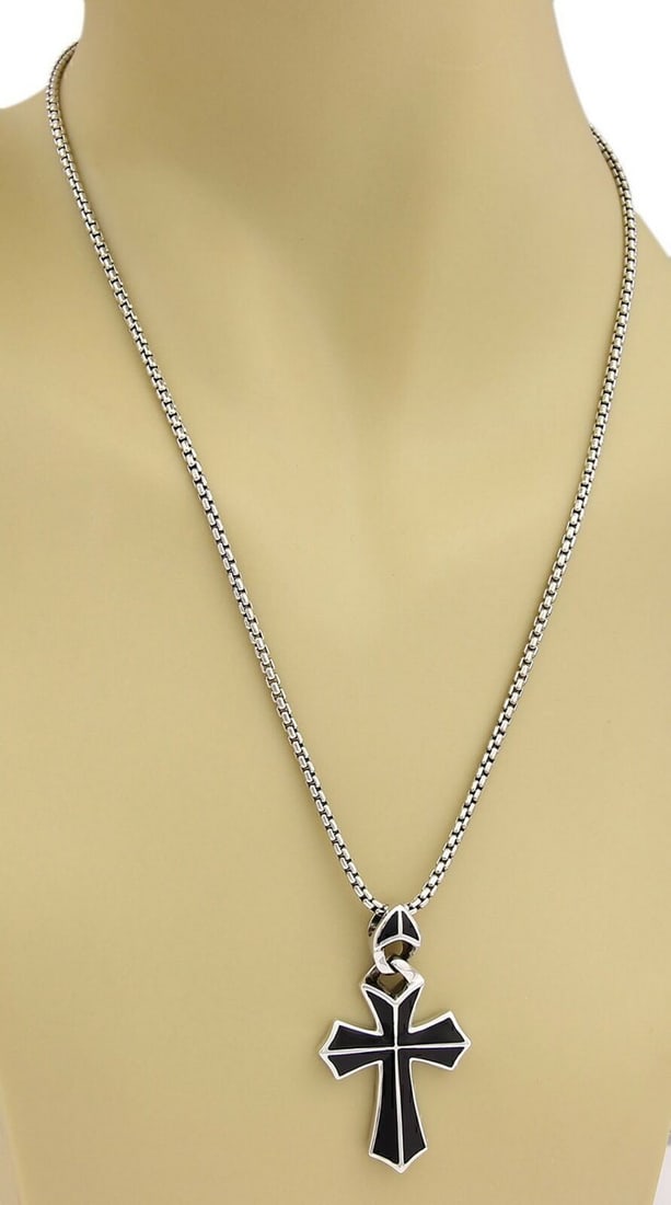 RAYMAN Onyx Cross Necklace in Sterling Silver by Stephen Webster: RAYMAN Onyx Cross Necklace in Sterling Silver by Stephen Webster This Stephen Webster RAYMAN necklace features a sterling silver cross pendant inlaid with black onyx, offering a bold and refined look.