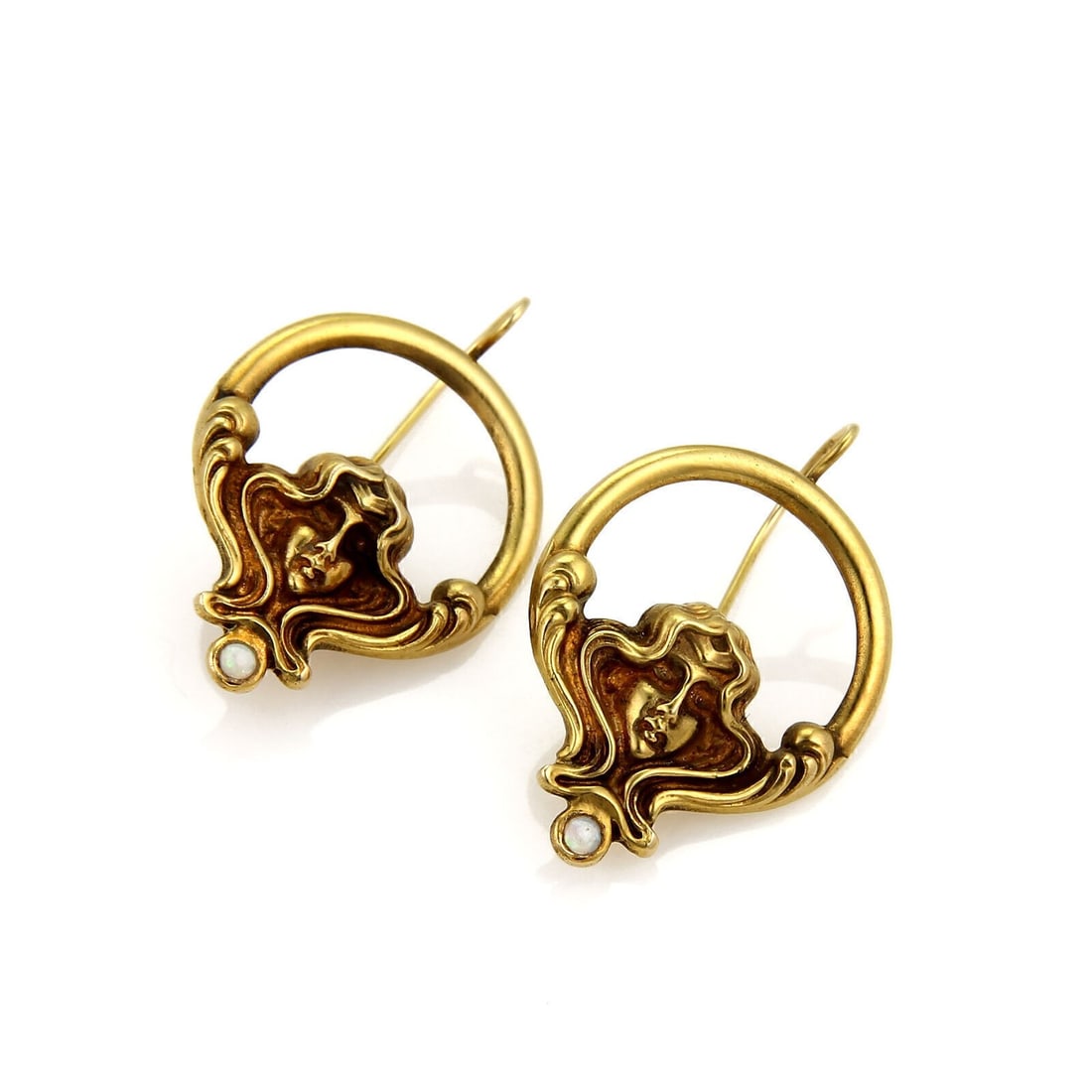 14k Yellow Gold Opal Dangle Earrings with Woman's Face Motif: 14k Yellow Gold Opal Dangle Earrings with Woman's Face Motif These dangle earrings feature a woman's face motif with opal stones set in 14k yellow gold. The earrings incorporate pearls measuring 2mm a