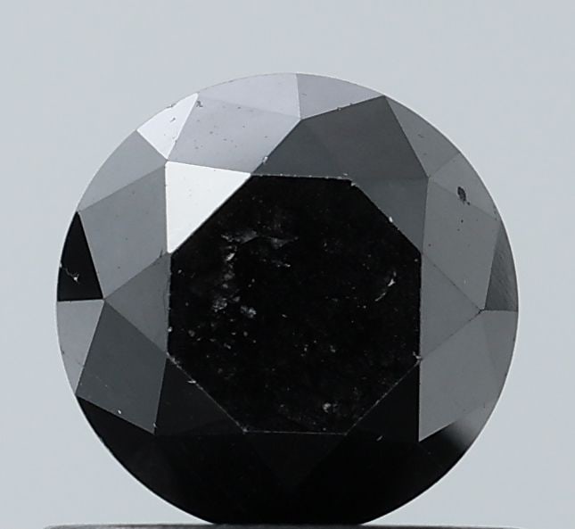 Loose Diamond - ROUND 0.87ct Fancy Black VS1: Loose Diamond - ROUND 0.87ct Fancy Black VS1 Source: Natural Shape: ROUND Carats: 0.87 Color: Fancy Black Certification: NONE Video: