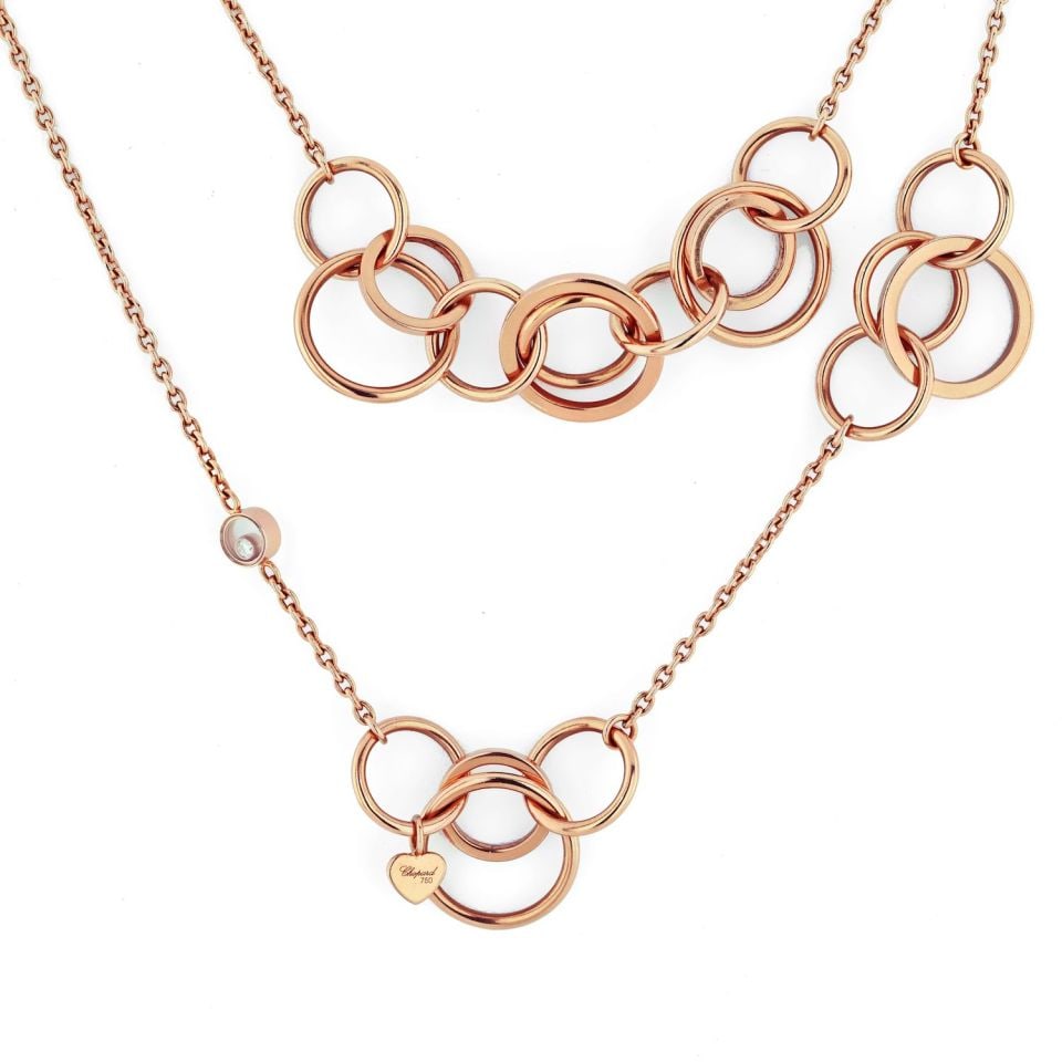 Chopard 18K Rose Gold Happy Diamonds 47 Inch Necklace: Chopard 18K Rose Gold Happy Diamonds 47 Inch Necklace This exquisite Chopard Happy Diamonds Necklace is crafted from luxurious 18K rose gold, weighing an impressive 53.1 grams. The necklace measures 4