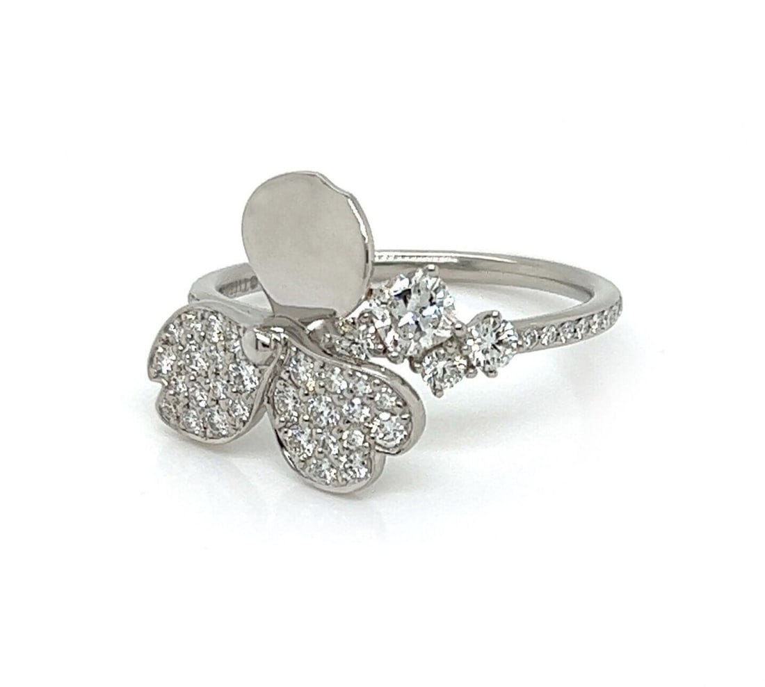 Paper Flower Diamond Platinum Ring 0.56ct Floral Motif Size 7: Paper Flower Diamond Platinum Ring 0.56ct Floral Motif Size 7 This Tiffany & Co. Paper Flower ring features a unique floral motif adorned with 0.56 carats of natural brilliant cut diamonds, elegantly