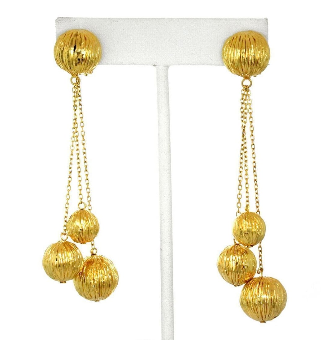 Giordana Castellan 14k Gold Triple Chain Dangle Earrings With Foil Wrap Balls: Giordana Castellan 14k Gold Triple Chain Dangle Earrings With Foil Wrap Balls These vintage dangle earrings by Giordana Castellan feature a triple chain design with foil wrap ball accents, crafted in