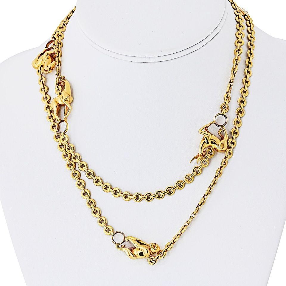 Rare Cartier 18K Yellow Gold 5 Animal Necklace 33 Inch: Rare Cartier 18K Yellow Gold 5 Animal Necklace 33 Inch Discover the beauty of this vintage Cartier necklace, a stunning 33-inch chain crafted from 18K yellow gold. This piece features five meticulousl