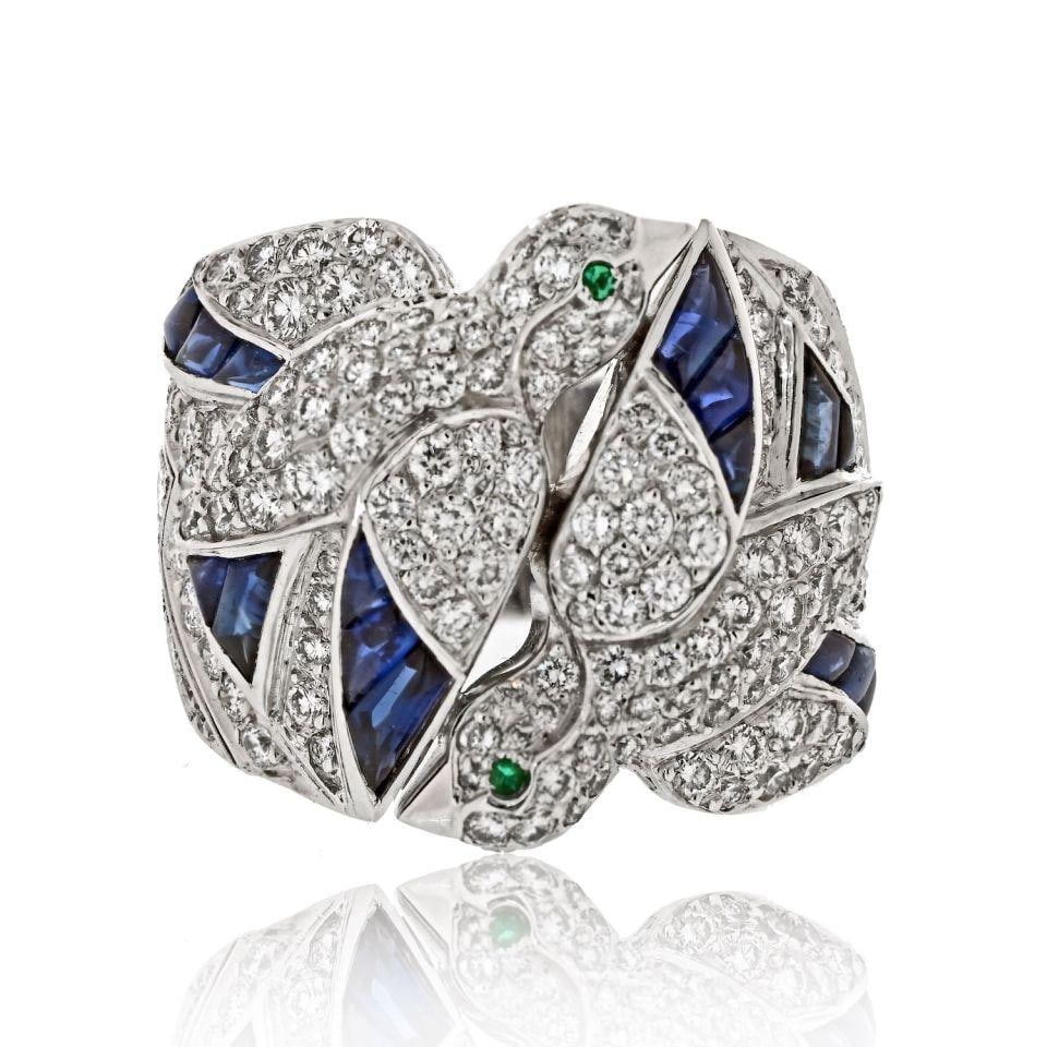 Cartier 18K White Gold Dove Ring with Diamond Emerald Sapphire: Cartier 18K White Gold Dove Ring with Diamond Emerald Sapphire This exquisite Cartier ring, crafted from 18K white gold, features a stunning design inspired by the theme of freedom, symbolized by a do