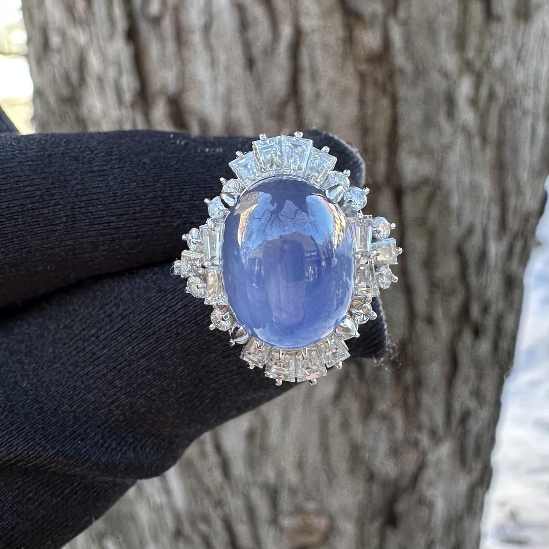 Platinum Ring With GIA Certified No Heat Ceylon Star Sapphire and Diamonds 11.47ctw: Platinum Ring With GIA Certified No Heat Ceylon Star Sapphire and Diamonds 11.47ctw This platinum cocktail ring features a natural, unheated Ceylon blue star sapphire weighing 10.09 carats, cut in an