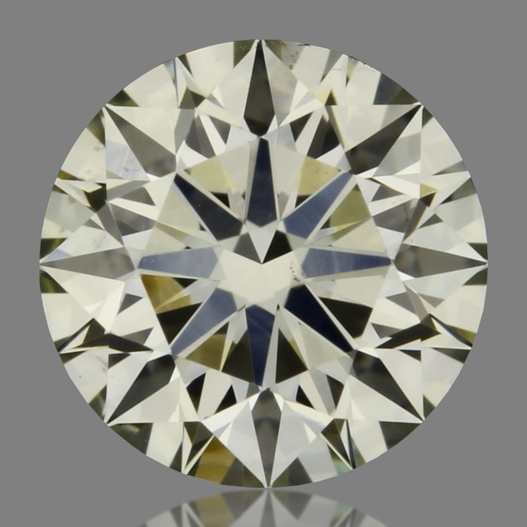 Loose Diamond - ROUND 0.36ct O-P VS2: Loose Diamond - ROUND 0.36ct O-P VS2 Source: Natural Shape: ROUND Carats: 0.36 Color: O-P Certification: IGI Video: