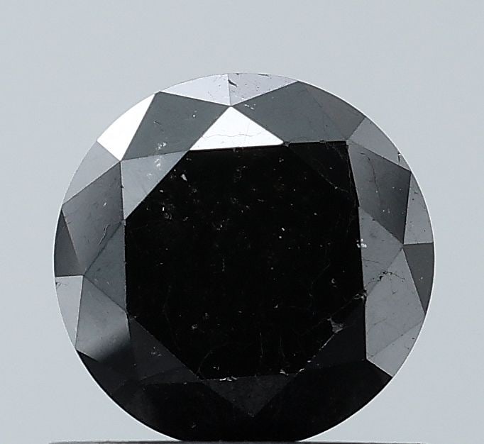 Loose Diamond - ROUND 0.92ct Black VS2: Loose Diamond - ROUND 0.92ct Black VS2 Source: Natural Shape: ROUND Carats: 0.92 Color: Black Certification: NONE Video: Video Link The Diamond Depot Guarantee: All items in this auction are