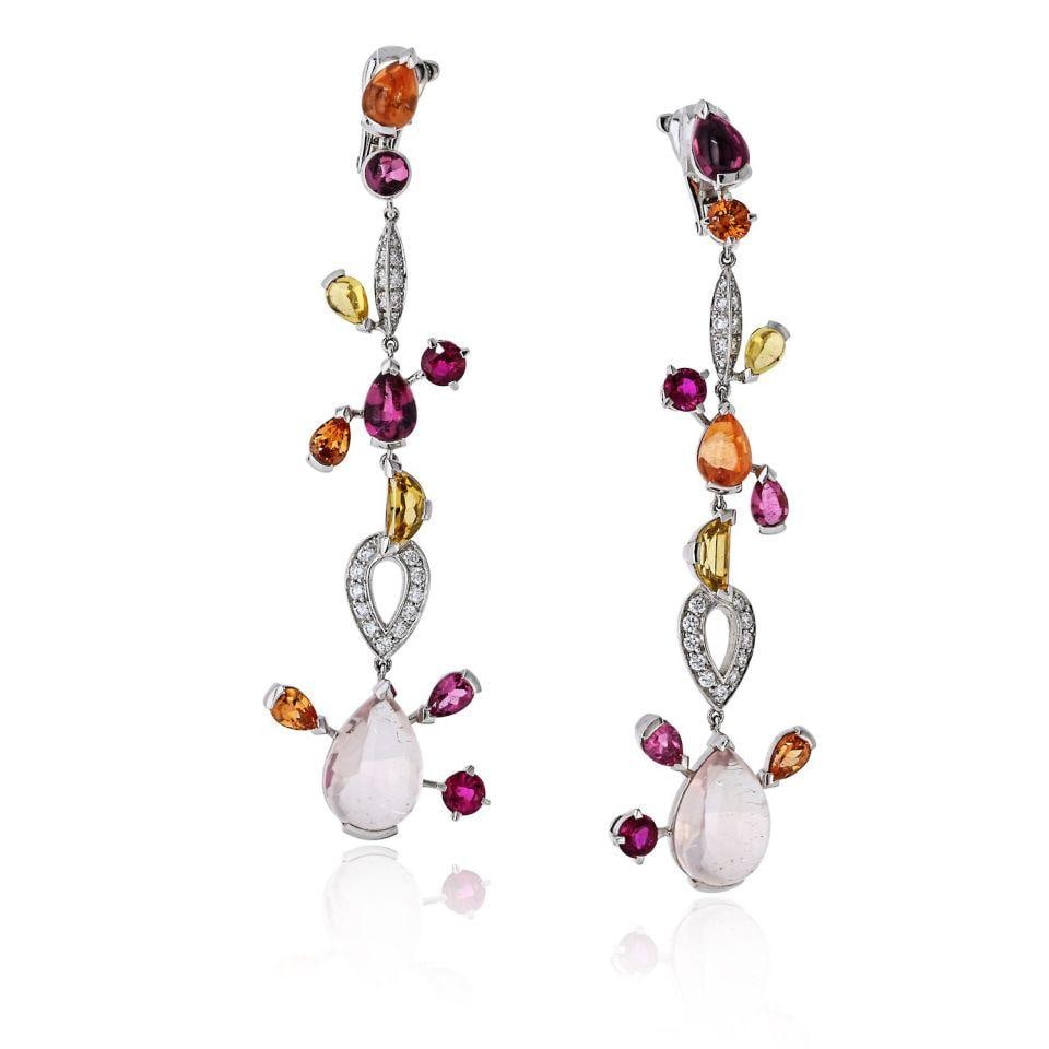 Cartier Meli Melo 18K White Gold Diamond and Gemstone Earrings: Cartier Meli Melo 18K White Gold Diamond and Gemstone Earrings Experience elegance with these Cartier 18K White Gold Meli Melo Diamond Drop and Colorstone Earrings. Crafted in luminous 18K white gold,