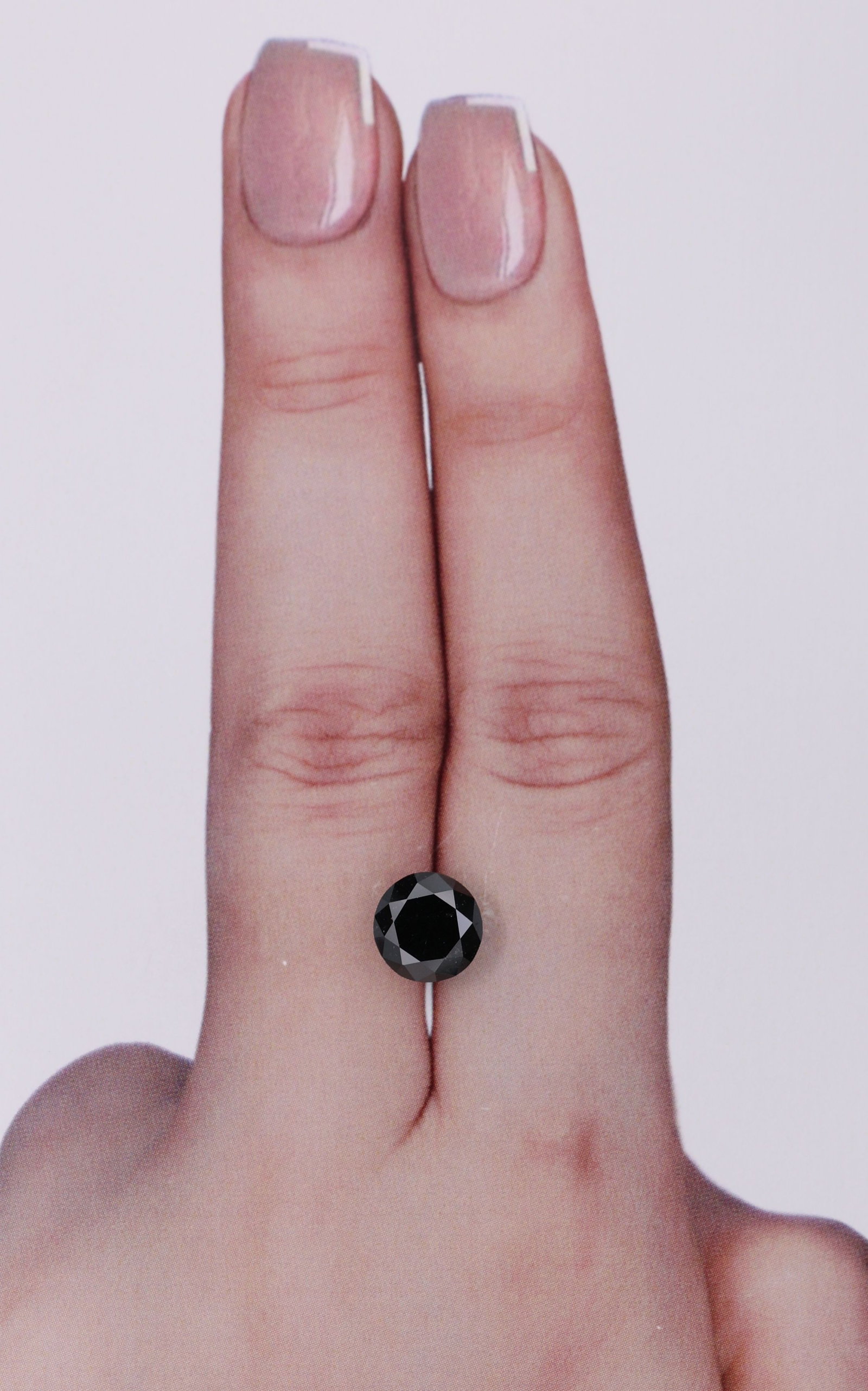 Loose Diamond - ROUND 1.84ct Fancy Black VVS2: Loose Diamond - ROUND 1.84ct Fancy Black VVS2 Source: Natural Shape: ROUND Carats: 1.84 Color: Fancy Black Certification: NONE Video: