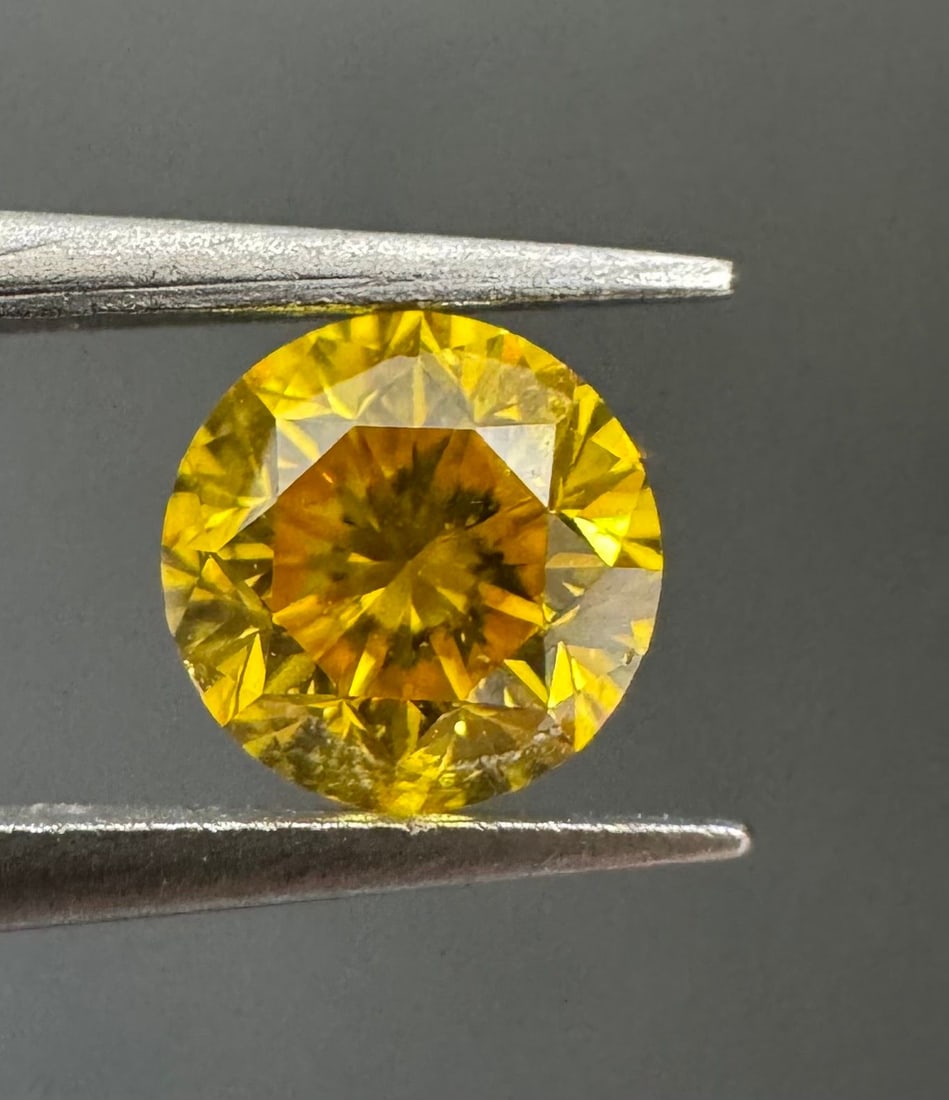 Loose Diamond - ROUND 0.32ct Fancy Vivid Orangey Yellow I2: Loose Diamond - ROUND 0.32ct Fancy Vivid Orangey Yellow I2 Source: Natural Shape: ROUND Carats: 0.32 Color: Fancy Vivid Orangey Yellow Certification: GIA The Diamond Depot Guarantee: All items in this