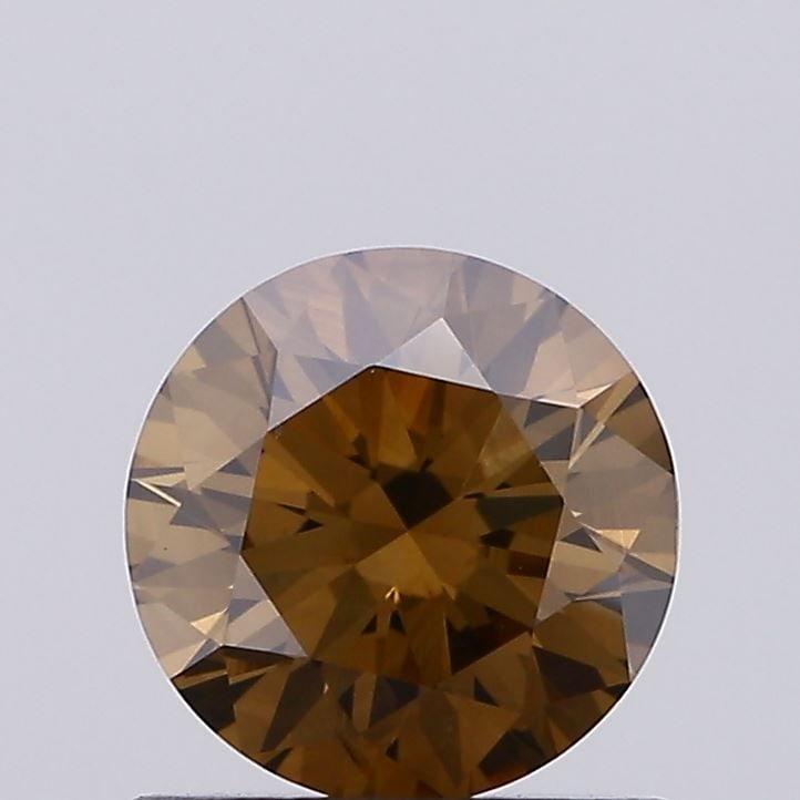 Loose Diamond - ROUND 0.66ct Fancy Brown VS1: Loose Diamond - ROUND 0.66ct Fancy Brown VS1 Source: Natural Shape: ROUND Carats: 0.66 Color: Fancy Brown Certification: NONE Video: Video Link The Diamond Depot Guarantee: All items in this