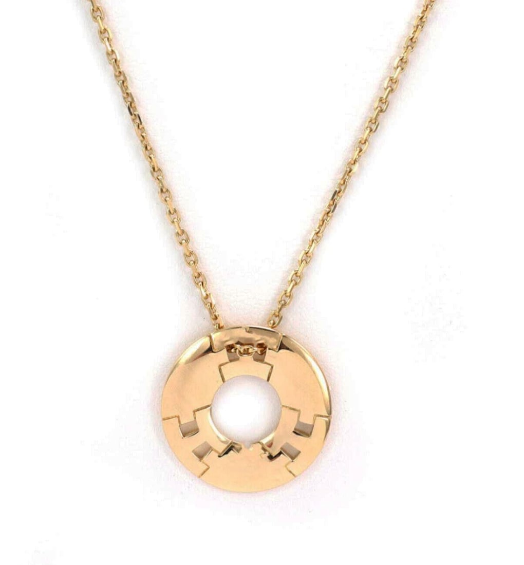 18k Yellow Gold Hermes H Circle Pendant Necklace with Signature: 18k Yellow Gold Hermes H Circle Pendant Necklace with Signature This pendant necklace features a round circle design crafted in 18k yellow gold, showcasing the iconic Hermes H motif. The piece is sign