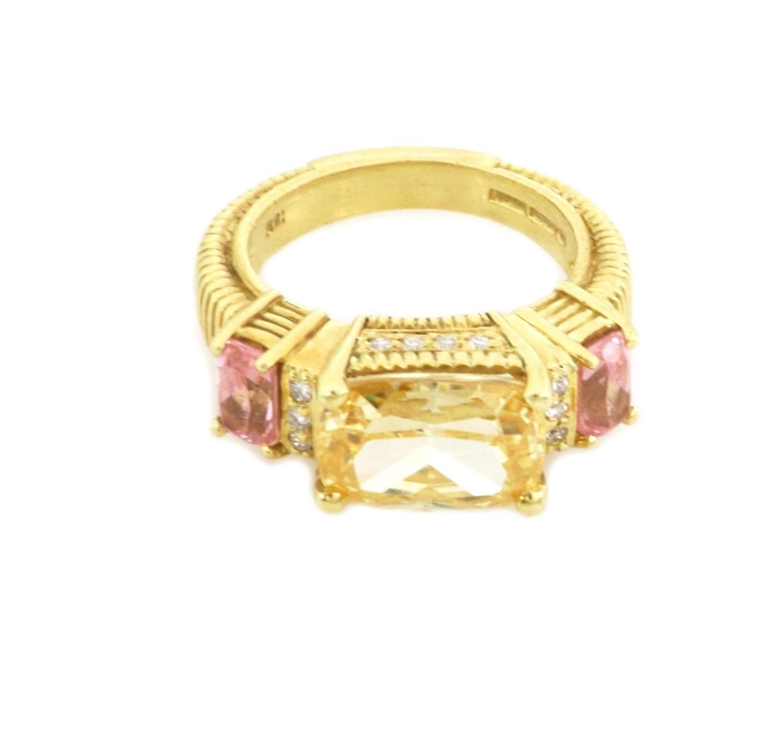 Judith Ripka 18k Yellow Gold Ring with Canary Crystal Pink Topaz and Diamonds: Judith Ripka 18k Yellow Gold Ring with Canary Crystal Pink Topaz and Diamonds This exquisite ring by Judith Ripka showcases a stunning rectangular faceted cut canary crystal, elegantly framed in textu