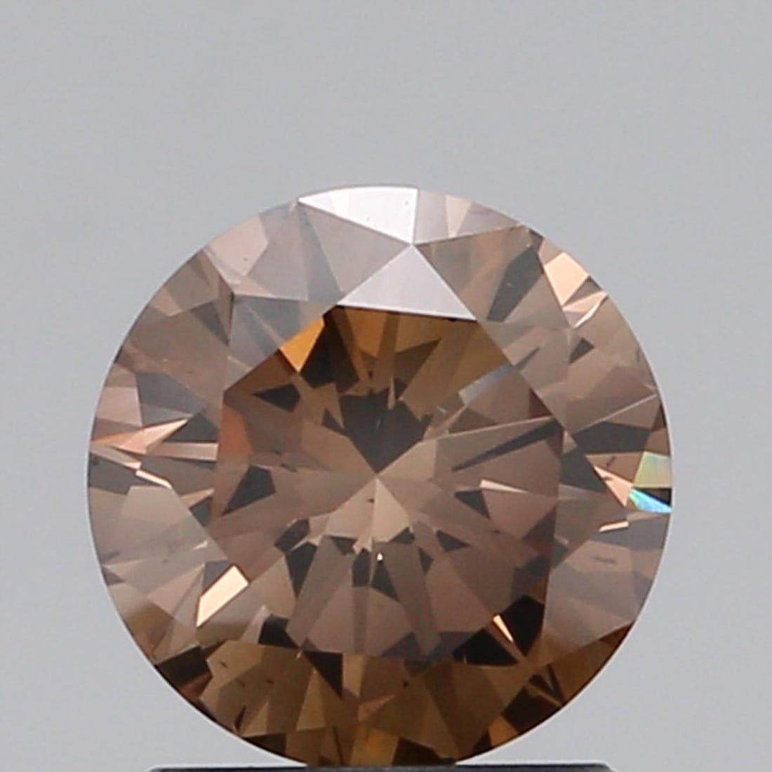 Loose Diamond - ROUND 1.25ct Orangey Brown VS2: Loose Diamond - ROUND 1.25ct Orangey Brown VS2 Source: Natural Shape: ROUND Carats: 1.25 Color: Orangey Brown Certification: NONE Video: