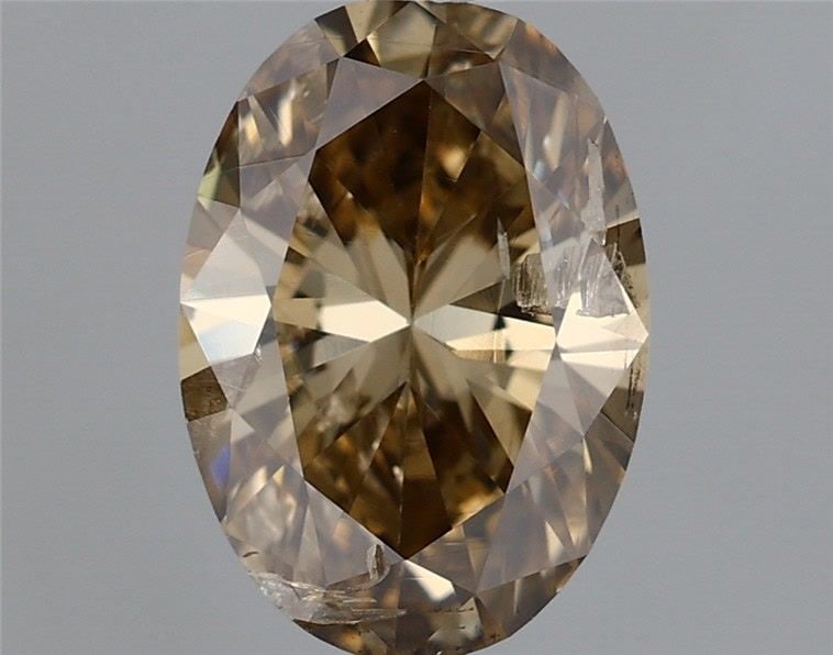 Loose Diamond - OVAL 0.99ct Fancy Dark Yellowish Brown: Loose Diamond - OVAL 0.99ct Fancy Dark Yellowish Brown Source: Natural Shape: OVAL Carats: 0.99 Color: Fancy Dark Yellowish Brown Certification: GIA Video: