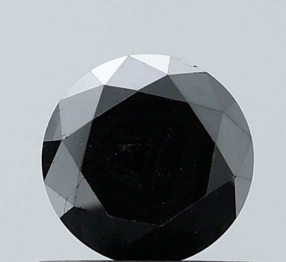 Loose Diamond - ROUND 0.94ct Black VVS2: Loose Diamond - ROUND 0.94ct Black VVS2 Source: Natural Shape: ROUND Carats: 0.94 Color: Black Certification: NONE Video: Video Link The Diamond Depot Guarantee: All items in this auction are