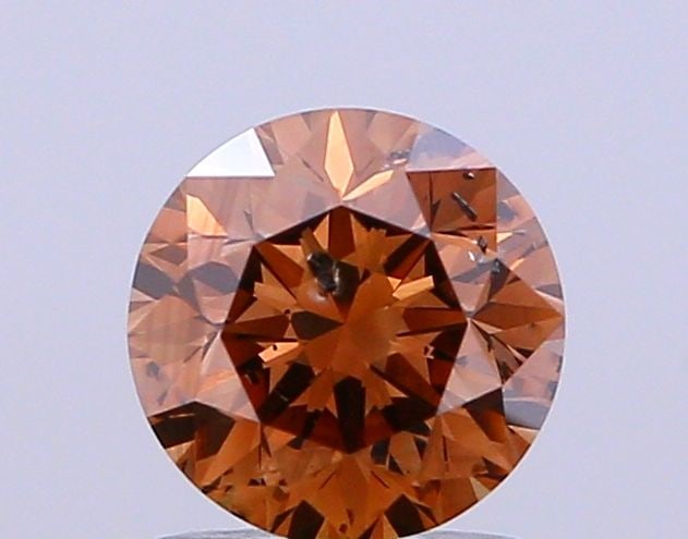 Loose Diamond - ROUND 1.15ct Fancy Brown SI2: Loose Diamond - ROUND 1.15ct Fancy Brown SI2 Source: Natural Shape: ROUND Carats: 1.15 Color: Fancy Brown Certification: NONE Video: Video Link The Diamond Depot Guarantee: All items in this