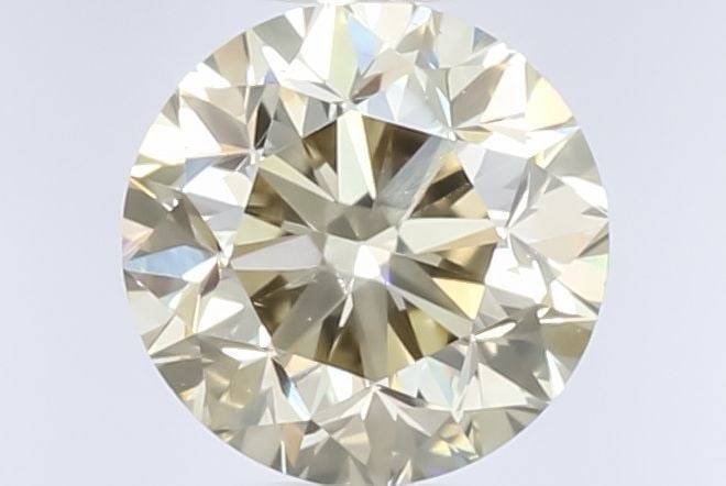 Loose Diamond - ROUND 0.65ct Fancy Yellow Brown: Loose Diamond - ROUND 0.65ct Fancy Yellow Brown Source: Natural Shape: ROUND Carats: 0.65 Color: Fancy Yellow Brown Certification: GIA Video: