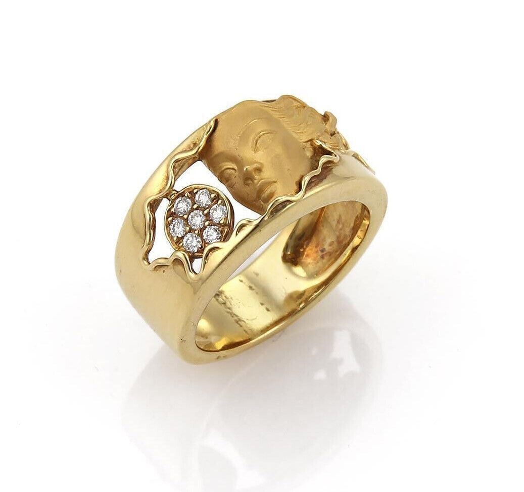 18k Yellow Gold Diamond Band Ring by Carrera y Carrera Woman Face Size 6.5: 18k Yellow Gold Diamond Band Ring by Carrera y Carrera Woman Face Size 6.5 This Carrera y Carrera band ring features a distinctive woman's face design, meticulously crafted from 18k yellow gold and ad