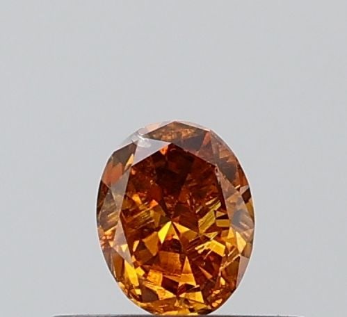 Loose Diamond - OVAL 0.32ct Fancy Orange SI2: Loose Diamond - OVAL 0.32ct Fancy Orange SI2 Source: Natural Shape: OVAL Carats: 0.32 Color: Fancy Orange Certification: NONE Video: