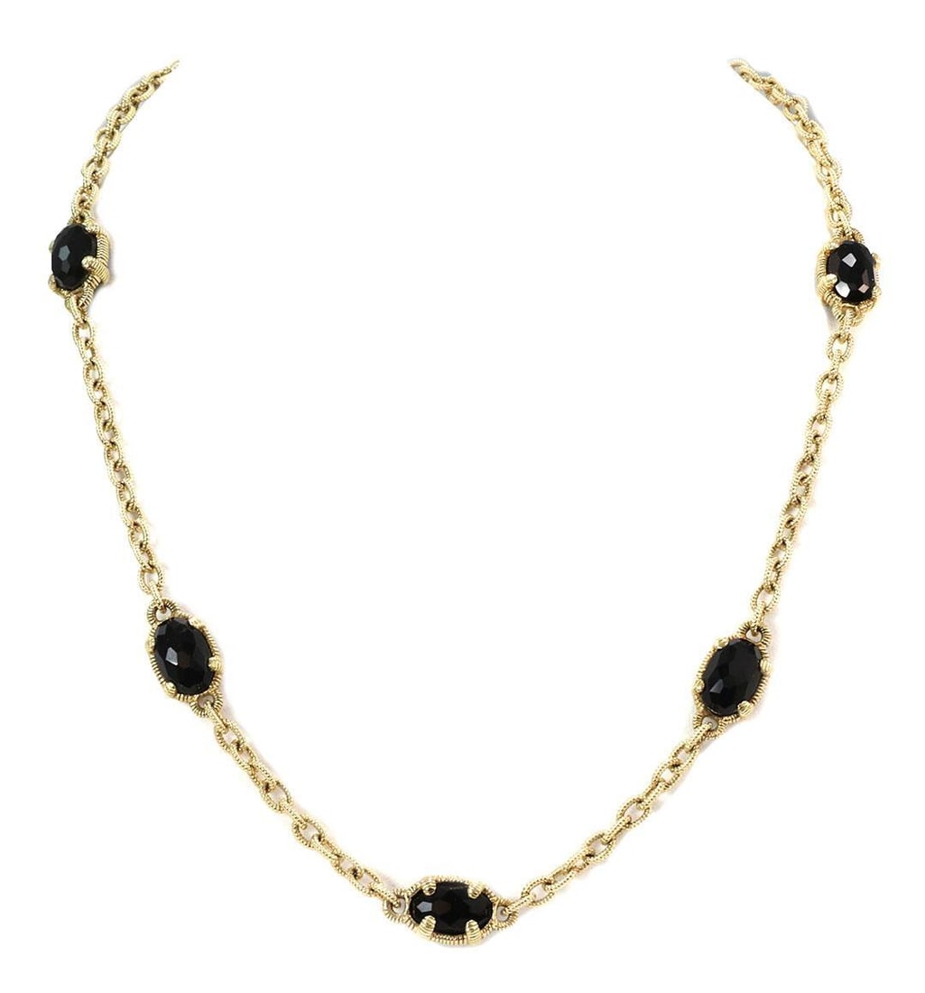 Judith Ripka 14k Yellow Gold Onyx Oval Link Necklace: Judith Ripka 14k Yellow Gold Onyx Oval Link Necklace This exquisite necklace by Judith Ripka features a stunning design crafted from 14k yellow gold. The necklace showcases fine wire-textured oval lin
