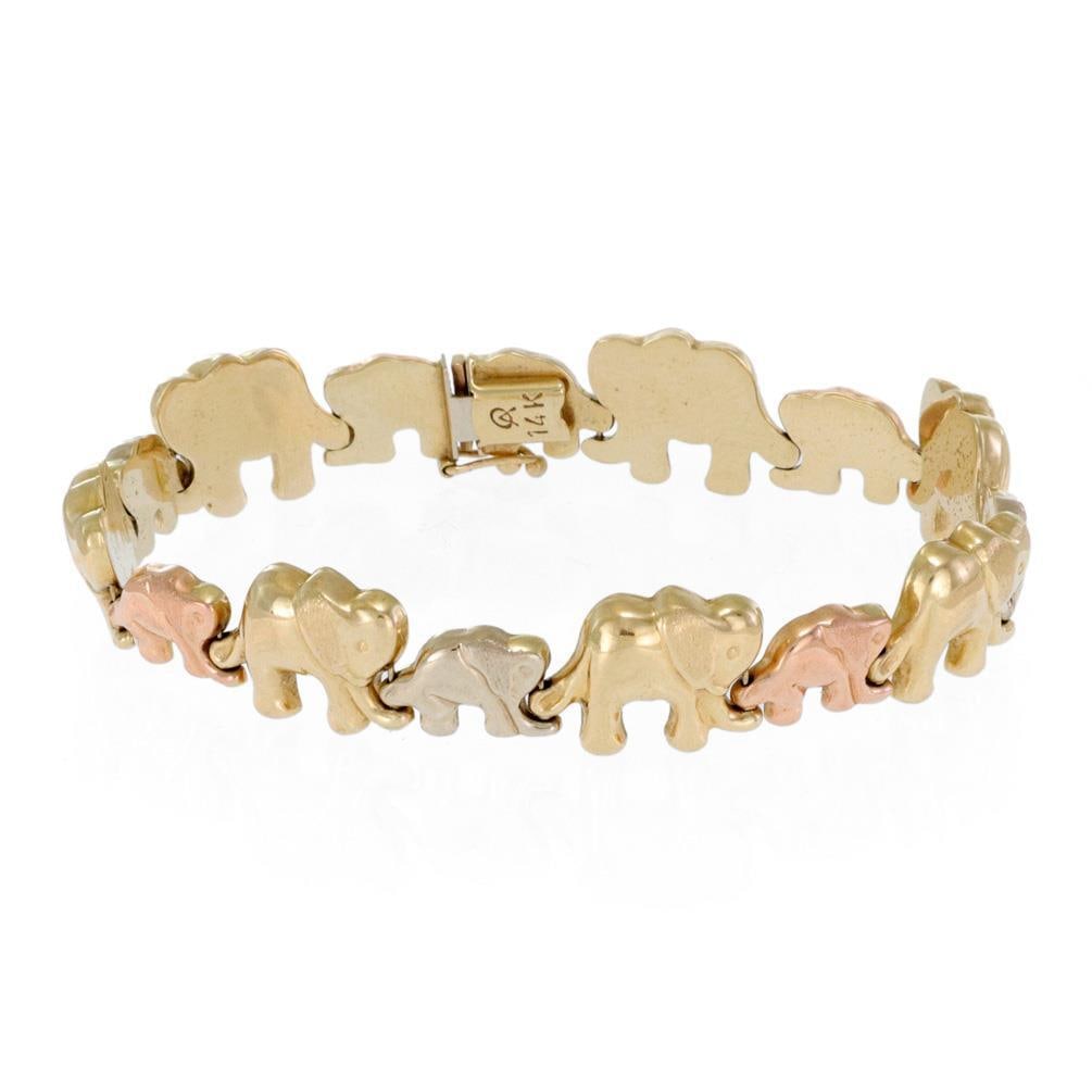 Chasing Elephant 14k Tricolor Gold Link Bracelet: Chasing Elephant 14k Tricolor Gold Link Bracelet This stunning Chasing Elephant Link Bracelet showcases a charming design featuring flex hollow links crafted from 14k yellow, rose, and white gold. The