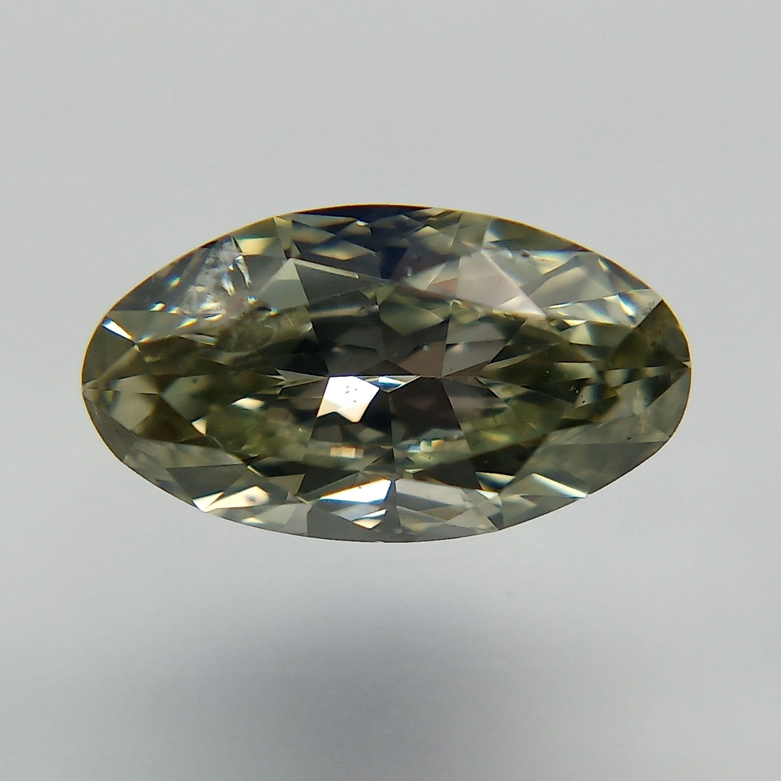 Loose Diamond - OVAL 0.44ct Fancy Grayish Yellowish Green: Loose Diamond - OVAL 0.44ct Fancy Grayish Yellowish Green Source: Natural Shape: OVAL Carats: 0.44 Color: Fancy Grayish Yellowish Green Certification: GIA The Diamond Depot Guarantee: All items