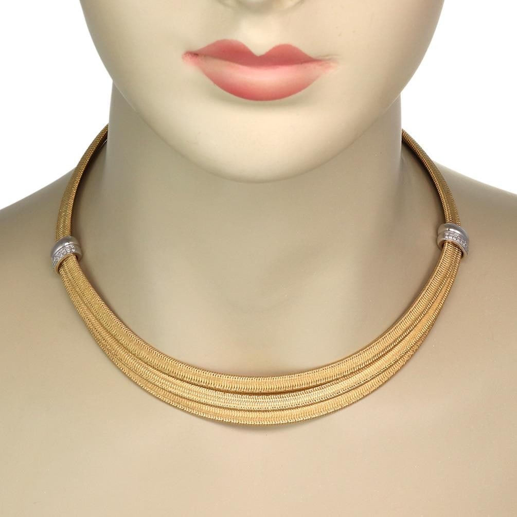 18k Gold Diamond Triple Strand Basket Weave Collar Necklace by Roberto Coin: 18k Gold Diamond Triple Strand Basket Weave Collar Necklace by Roberto Coin This authentic Roberto Coin collar necklace is crafted from 18k yellow gold with white gold accents. It features a triple-st