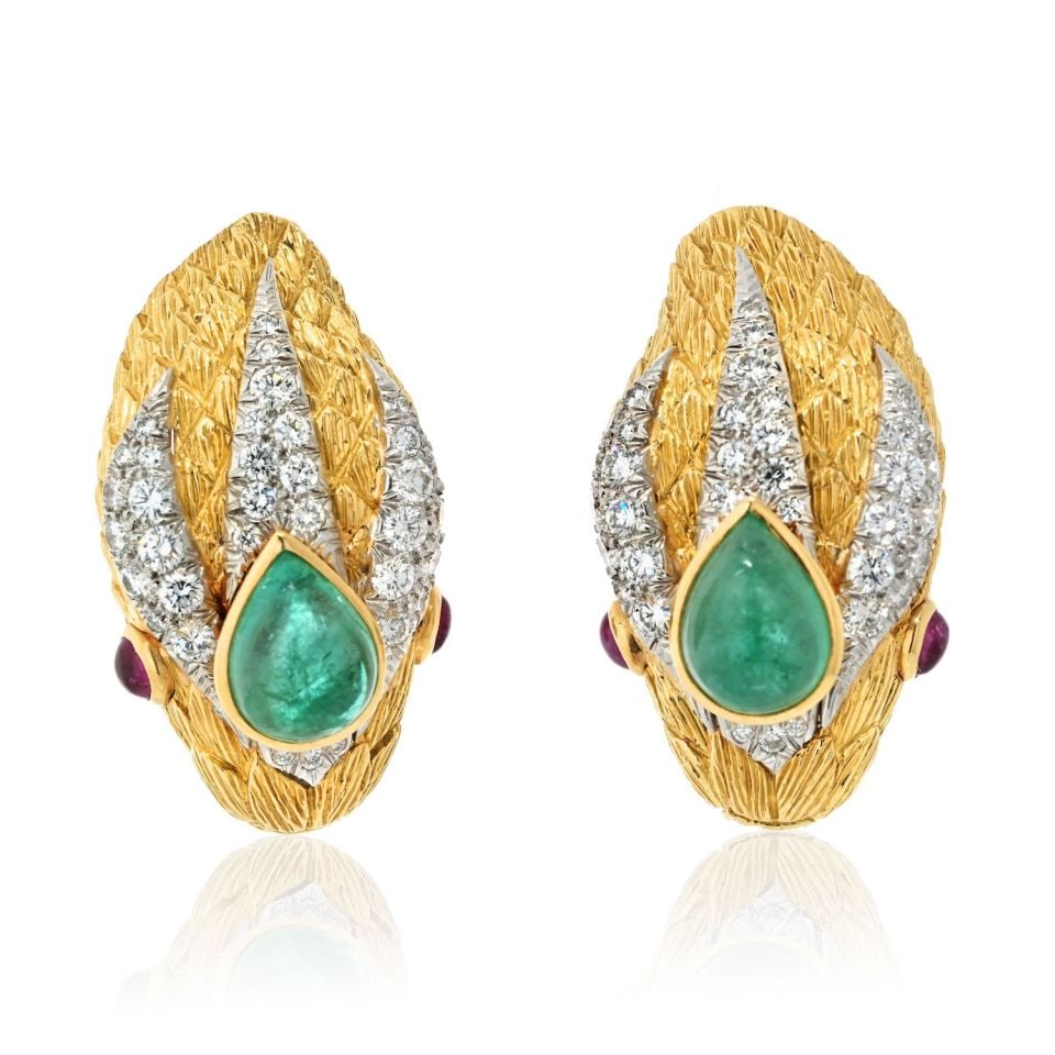 David Webb Vintage Platinum 18K Gold Snake Earrings with Emerald Ruby Diamonds: David Webb Vintage Platinum 18K Gold Snake Earrings with Emerald Ruby Diamonds These stunning vintage clip-on earrings by David Webb are crafted from a luxurious combination of platinum and 18K yellow