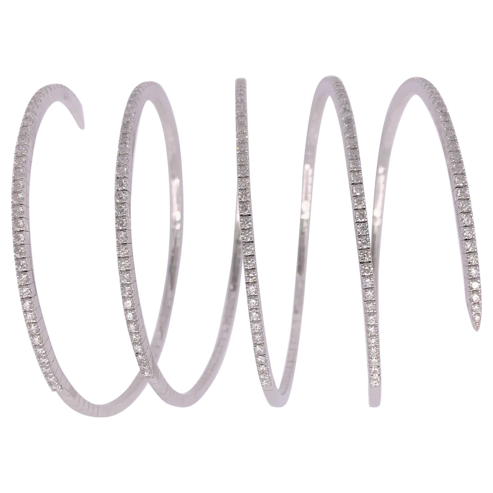 Harbor Diamonds 14k White Gold 5.70 Carat Diamond Bangle Cuff: Harbor Diamonds 14k White Gold 5.70 Carat Diamond Bangle Cuff This exquisite stretchable wrap-around bangle cuff is crafted from luxurious 14k white gold and adorned with 226 natural round diamonds, t