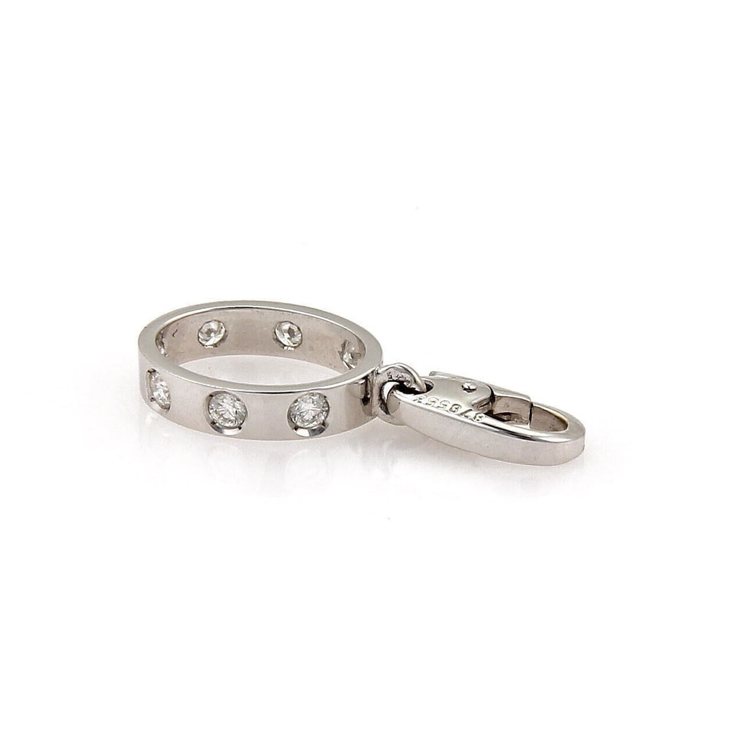 Mini Oval Pendant Charm in 18k White Gold with 7 Diamonds by Cartier Love: Mini Oval Pendant Charm in 18k White Gold with 7 Diamonds by Cartier Love This Cartier Love Mini Oval Ring Charm Pendant is crafted in 18k white gold and set with seven diamonds totaling 0.28 carats.