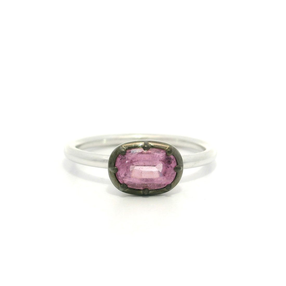 GIA Certified 1.03ct Cushion Pink Spinel Platinum Solitaire Ring: GIA Certified 1.03ct Cushion Pink Spinel Platinum Solitaire Ring This exquisite solitaire ring features a stunning natural cushion cut spinel, weighing 1.03 carats, in a delicate powder pink hue. The