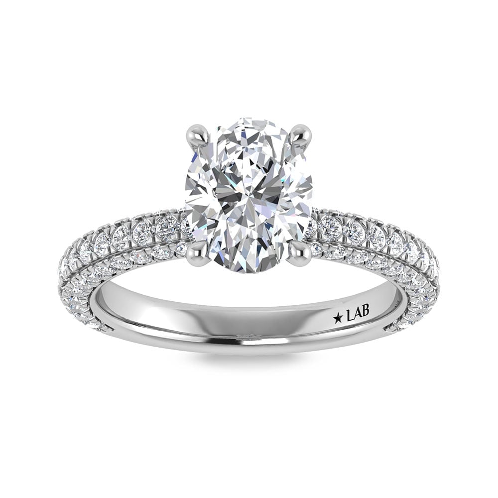 14K White Gold Lab Grown Diamond 3 Ct.Tw. Oval Shape Halo Engagement Ring (IGI Certified Center: 14K White Gold Lab Grown Diamond 3 Ct.Tw. Oval Shape Halo Engagement Ring (IGI Certified Center 2ct) Discover subtle brilliance and modern elegance with our Hidden Halo Diamond Engagement Ring. This