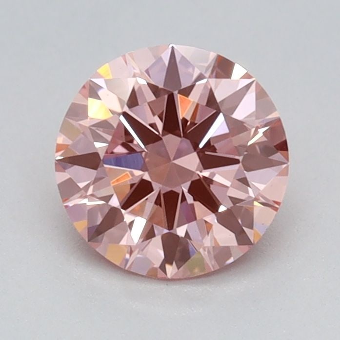 Ideal Loose Diamond - ROUND 0.68ct Fancy Vivid Pink VVS2: Ideal Loose Diamond - ROUND 0.68ct Fancy Vivid Pink VVS2 Source: This is a real non-mined Diamond that has been grown in a lab Shape: ROUND Carats: 0.68 Color: Fancy Vivid Pink Certification: IGI