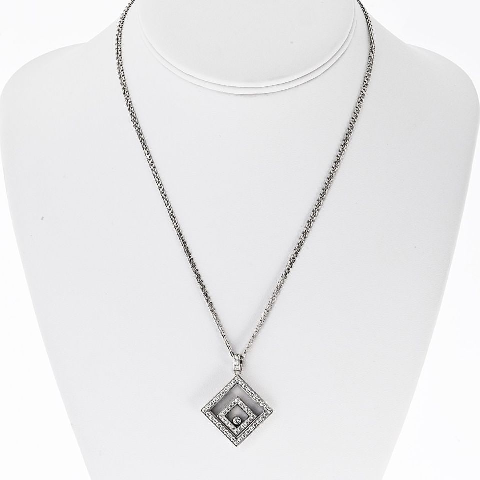 Happy Diamonds 1.5ct Square Pendant Necklace in 18K White Gold by Chopard: Happy Diamonds 1.5ct Square Pendant Necklace in 18K White Gold by Chopard This elegant necklace by Chopard features a distinctive square pendant crafted from 18K white gold, set with approximately 1.5