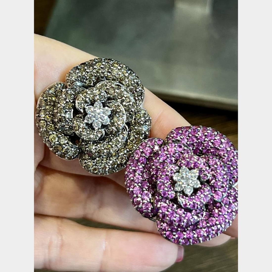 Stunning 18K White Gold Flower Earrings with Pink Sapphires and Diamonds: Stunning 18K White Gold Flower Earrings with Pink Sapphires and Diamonds These exquisite 18K white gold earrings feature a stunning flower design, adorned with approximately 11.00 Ct. of dazzling diam