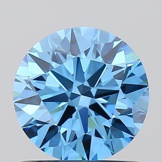 Ideal Loose Diamond - ROUND 0.78ct Fancy Vivid Blue VVS1: Ideal Loose Diamond - ROUND 0.78ct Fancy Vivid Blue VVS1 Source: This is a real non-mined Diamond that has been grown in a lab Shape: ROUND Carats: 0.78 Color: Fancy Vivid Blue Certification: IGI