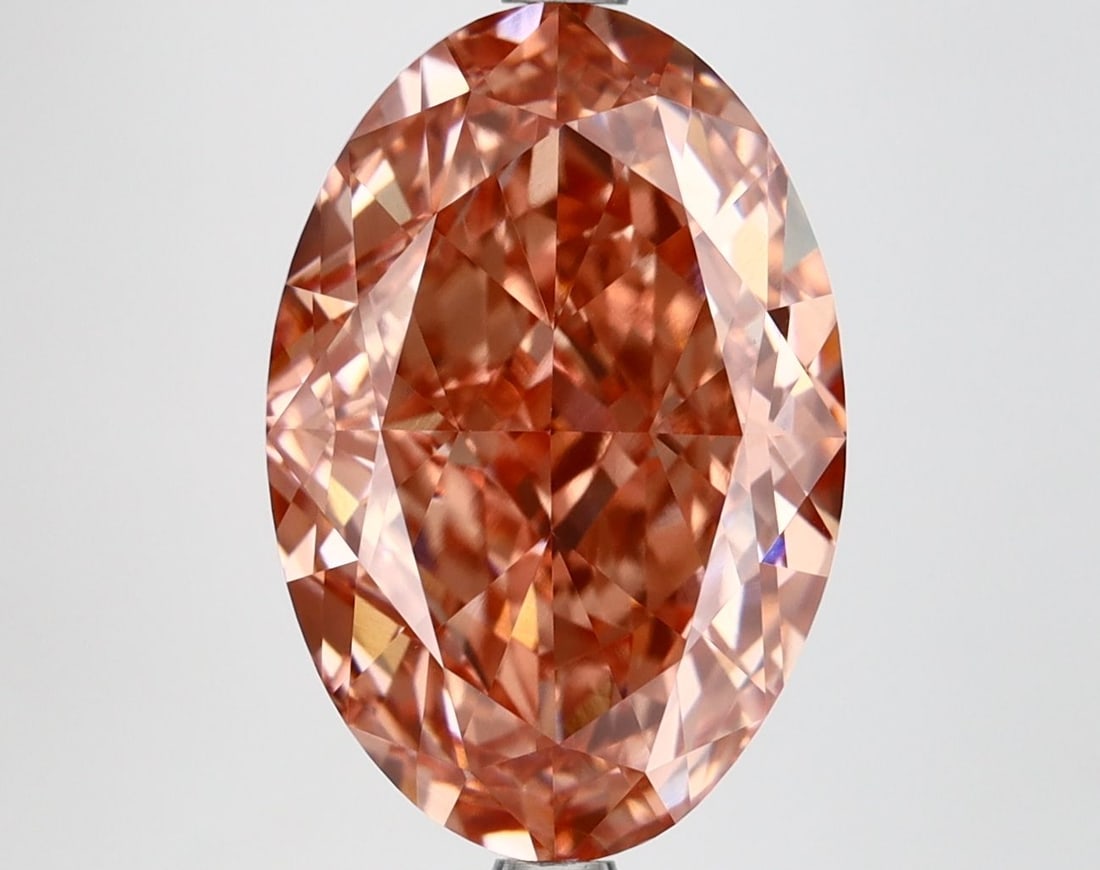 Loose Diamond - OVAL 6.14ct Fancy Vivid Brownish Pink VVS2: Loose Diamond - OVAL 6.14ct Fancy Vivid Brownish Pink VVS2 Source: This is a real non-mined Diamond that has been grown in a lab Shape: OVAL Carats: 6.14 Color: Fancy Vivid Brownish Pink